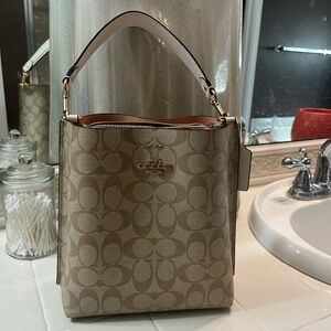 Coach Tan Bucket Bag with Signature Monogram